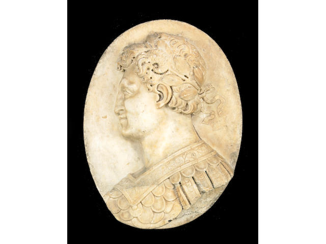 A carved marble oval plaque of a Roman Senator