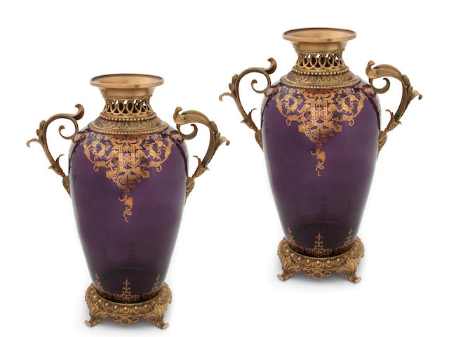 A pair of Louis XV style gilt bronze mounted amethyst glass vase