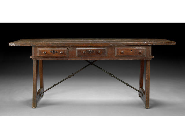 A Spanish Baroque walnut and oak library table