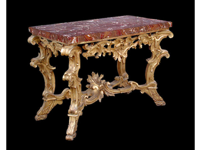 A superb Italian Baroque giltwood console table with Sicilian jasper veneered top