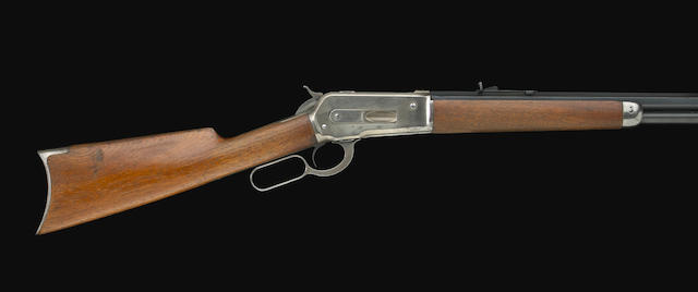A Winchester Model 1886 lever action rifle