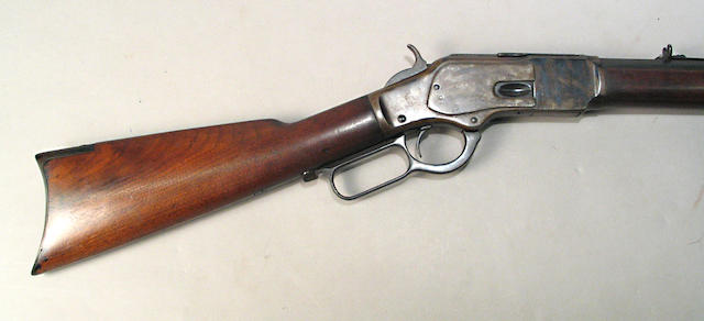 A Winchester Model 1873 lever action rifle