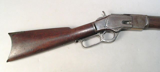 A Winchester late 2nd Model 1873 lever action rifle