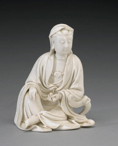 Bonhams : A Dehua seated figure of Guanyin He Chaozong Mark, 19th Century