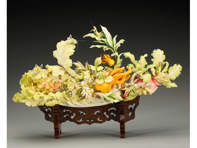 A  pieced and polychromed fruit and vegetable group 20th Century