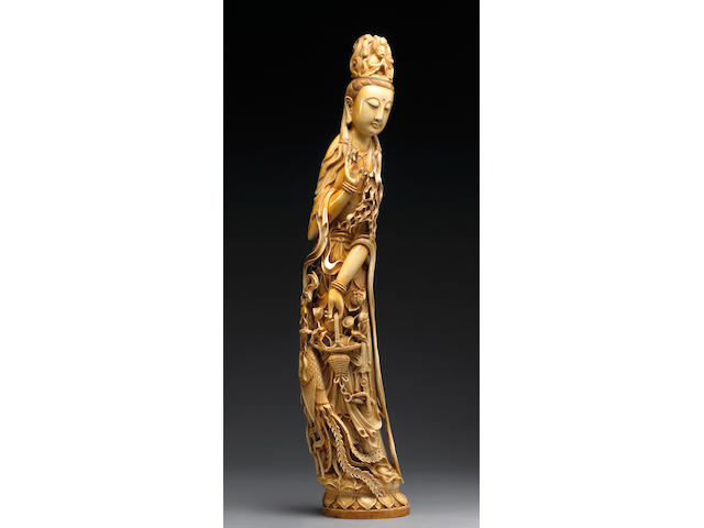 A large pieced and tinted ivory figure of Guanyin First half of 20th Century