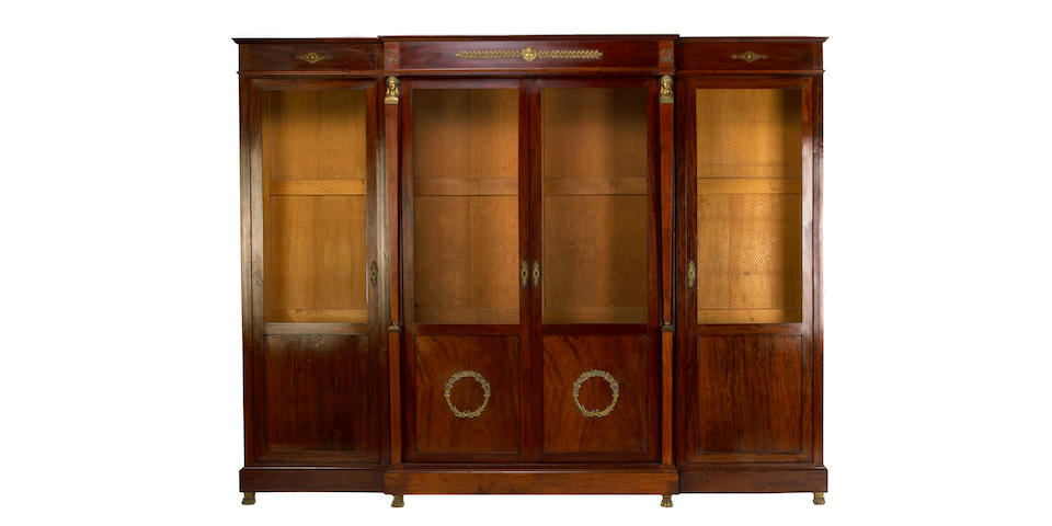 An Empire style gilt bronze mounted mahogany bibliotheque