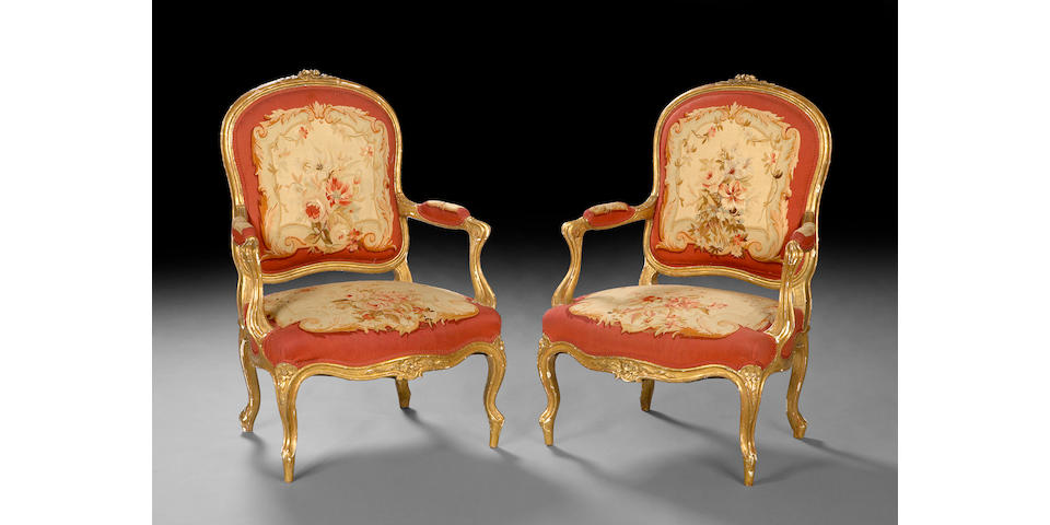 A pair of Louis XV style giltwood Aubusson upholstered fauteuils