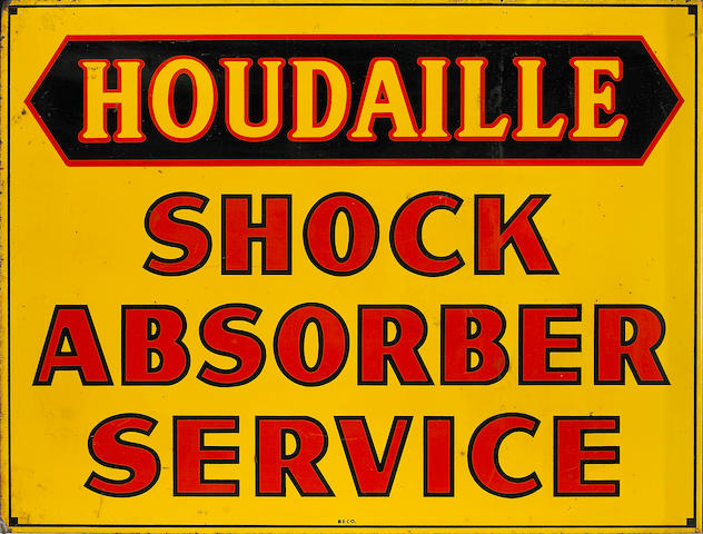 A 'Houdaille Shock Absorber Service' advertising sign,