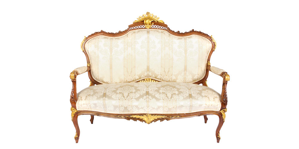 A Louis XV style gilt heightened settee