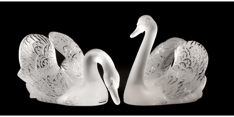 Two Lalique molded frosted glass swans: Cygne T&#234;te Pench&#232;e