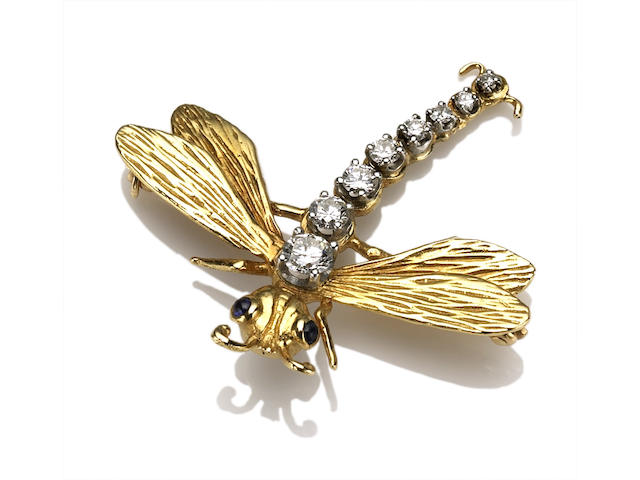 A diamond, sapphire and 18k gold dragonfly brooch