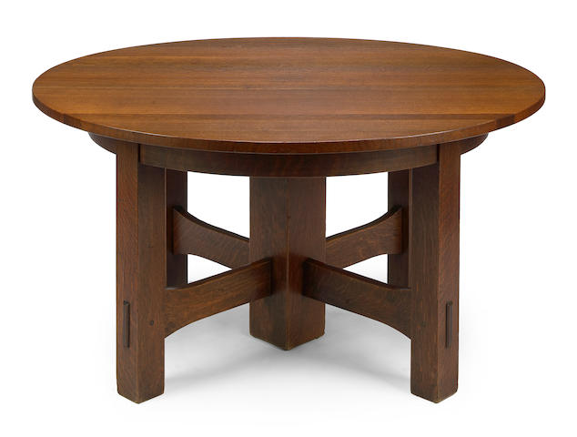 A Gustav Stickley oak circular dining table