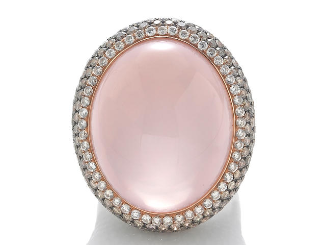 A rose quartz, colored diamond and diamond ring