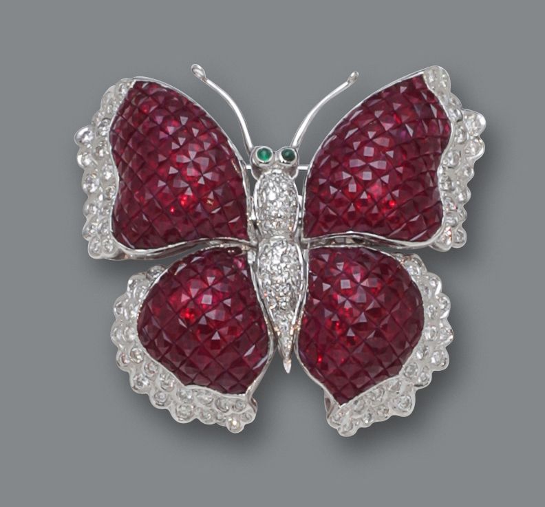 A ruby, emerald and diamond brooch