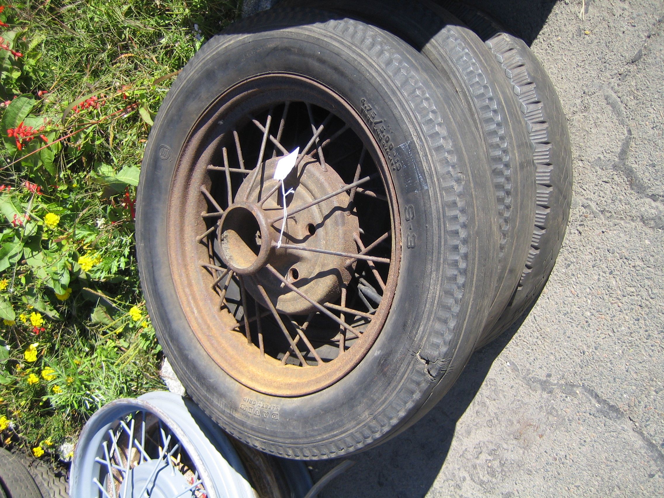 Bonhams Cars : Three Model A 19 inch wheels with tires