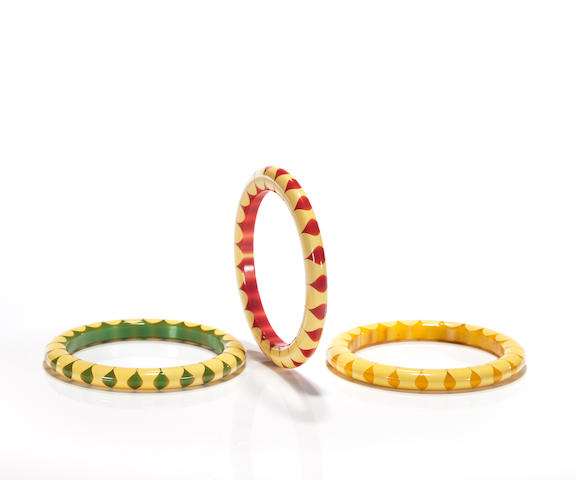 A group of three Bakelite "bowtie" bangle bracelets