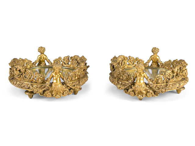 An impressive pair of Napoleon III gilt bronze surtouts de table  mid 19th century