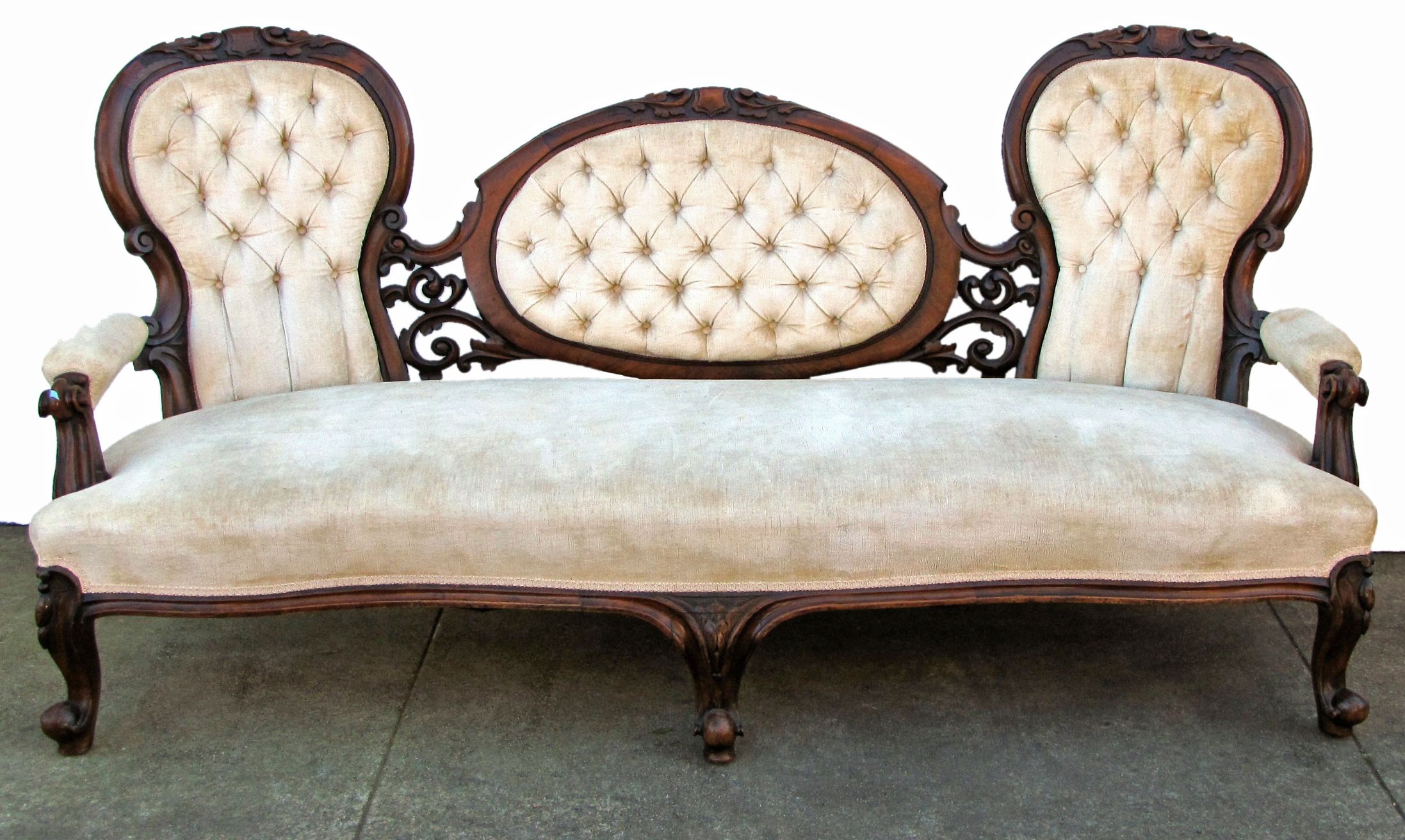 A Rococo Revival mahogany sofa