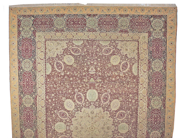 A Hereke carpet Turkey size approximately 16ft. 7in. x 25ft.