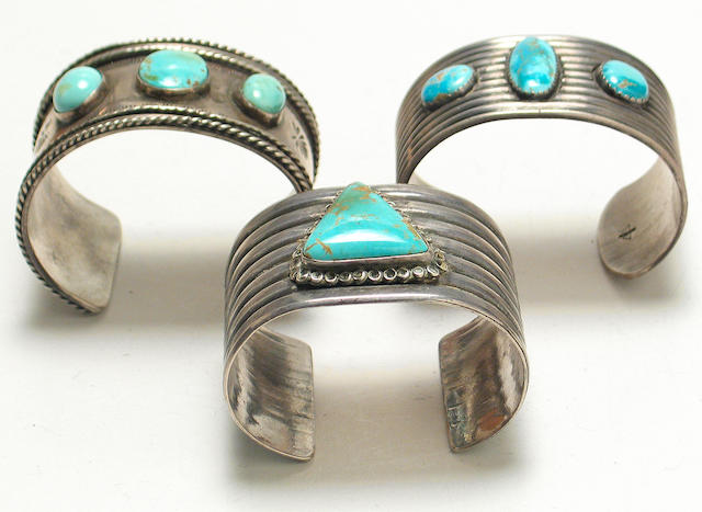 Bonhams : Three Navajo silver and turquoise cuff bracelets