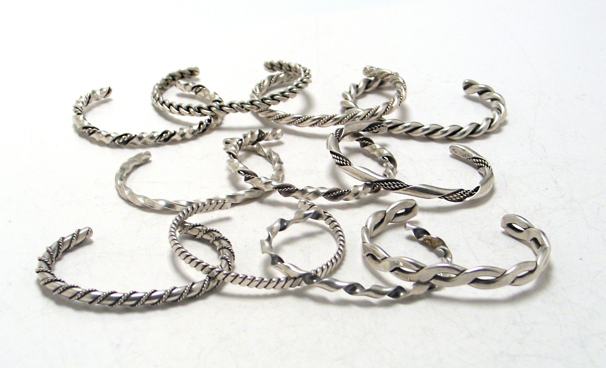 Eleven Southwest silver bangle bracelets