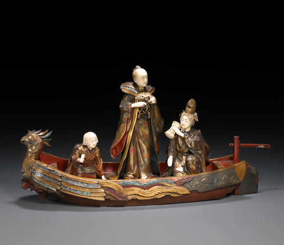 AN IVORY AND LACQUER FIGURAL GROUP Late 19th century