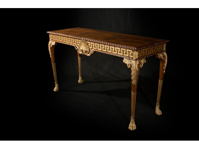 A George II style mahogany and giltwood side table