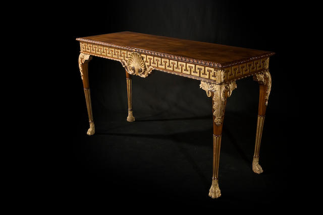 A George II style mahogany and giltwood side table