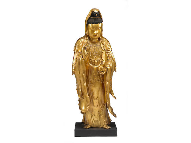 A large lacquered wood standing figure of Guanyin 19th Century