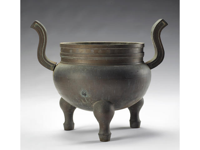 A heavy cast bronze tripod censer Dated by Inscription to 1801