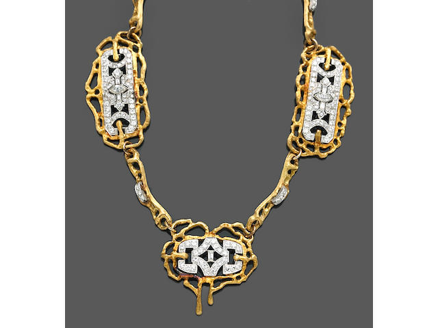 A diamond, platinum and eighteen karat gold necklace