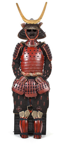 A RED-LACQUER SUIT OF ARMOR 18th century, the helmet by Myochin Hisaie