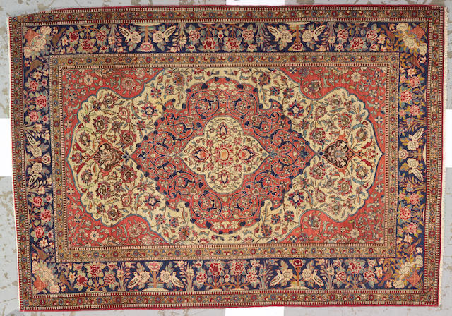 An Isphahan carpet size approximately 4ft. 5in. x 6ft. 9in.