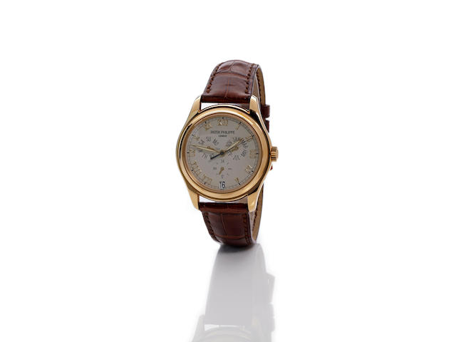 Patek Philippe. An 18K gold annual calendar automatic wristwatch with center secondsRef. 5035, movement no. 3137324, 1990's