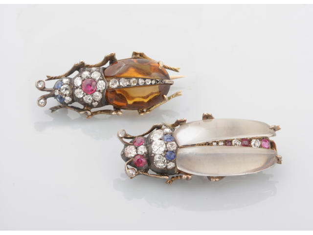 A pair of diamond, gem-set and gold insect brooches