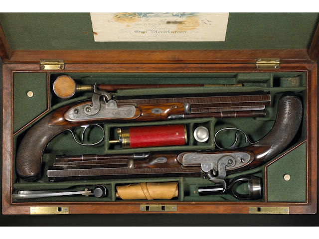 A fine cased pair of English percussion duelling pistols by James Purdey