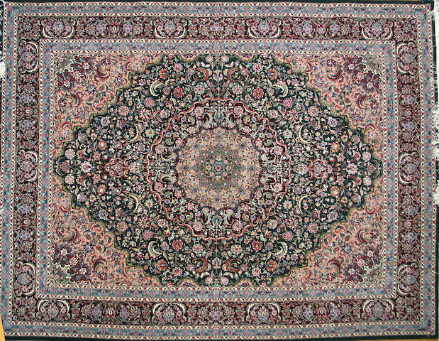 A Chinese carpet size approximately 8ft. x 10ft.