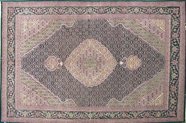 A  Chinese carpet size approximately 6ft. x 9ft.