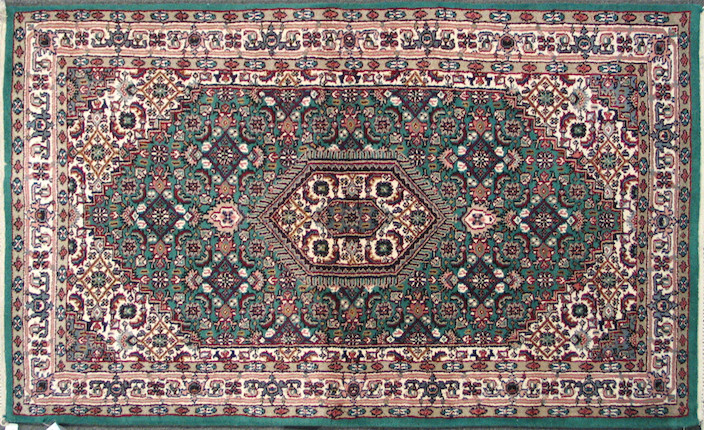 An Indian carpet size approximately 3ft. x 5ft. image 1