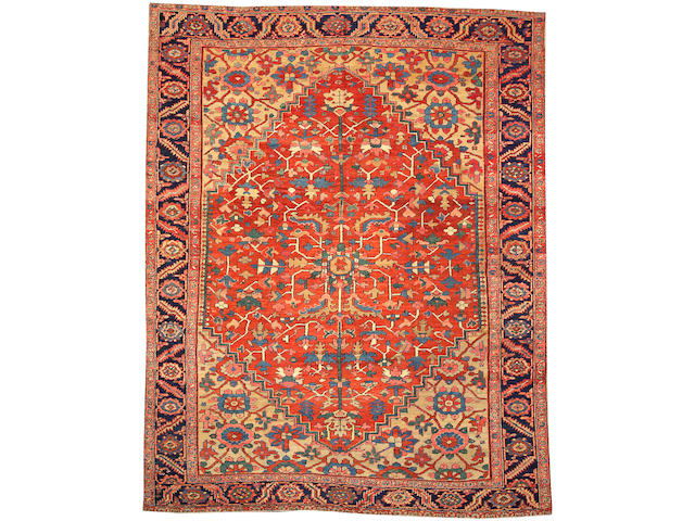 A Heriz carpet size approximately 9ft. x 11ft. 6in.