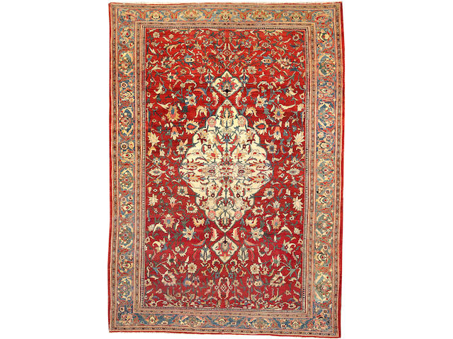 A Fereghan carpet Size approximately 6ft. 11in. x 9ft. 10in.