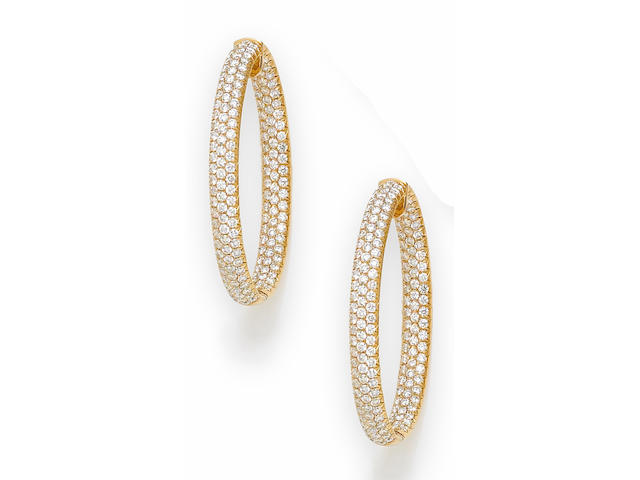 A pair of diamond large hoop earrings