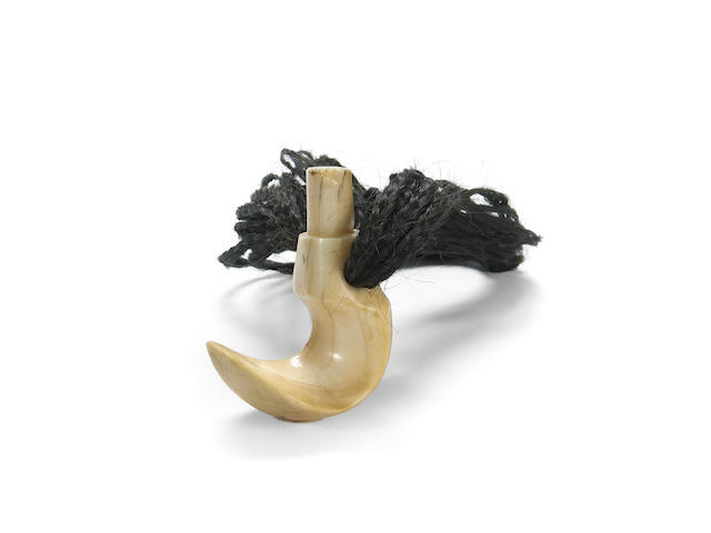 A Hawaiian walrus ivory hook pendant necklace, lei niho palaoa
