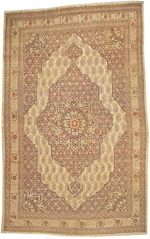 A Tabriz carpet Northwest Persia, size approximately 10ft. 10in. x 17ft. 4in.