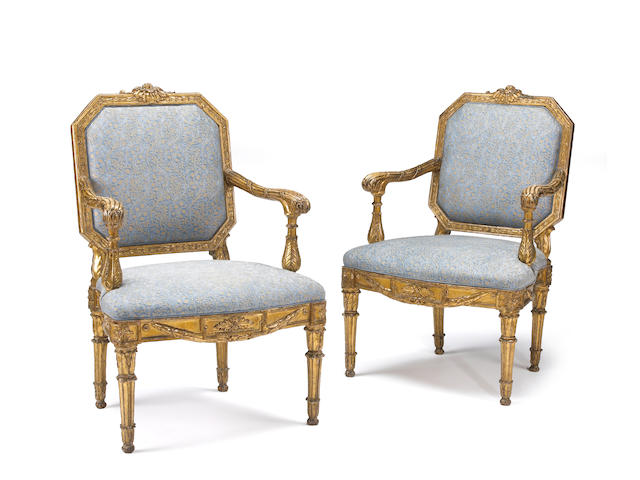 A superb set of four Italian Neoclassical giltwood armchairs late 18th century
