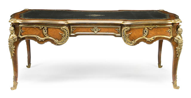 A fine Louis XV style gilt-bronze mounted kingwood and walnut bureau plat  H. Conquet after a model by Charles Cressent fourth quarter 19th century