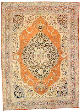 A Tabriz carpet Northwest Persia, size approximately 9ft. 1in. x 12ft. 9in. image 1