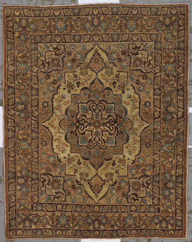 A Tabriz rug Northwest Persia, size approximately 4ft. 2in. x 5ft. 3in.