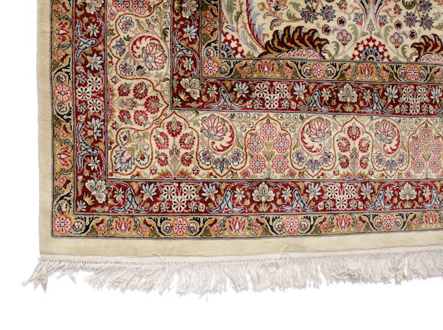 A Pakistani carpet size approximately 9ft. x 12ft.